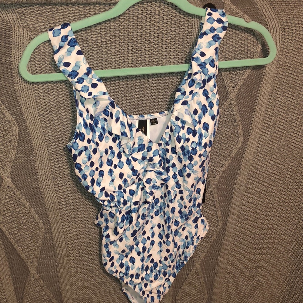 Nip Tuck Swim Suit